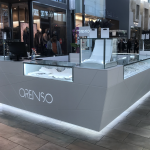 Retail shopping center stand: Melamine, metal and glass