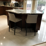 Kitchen: Wood cabinets and stone counters